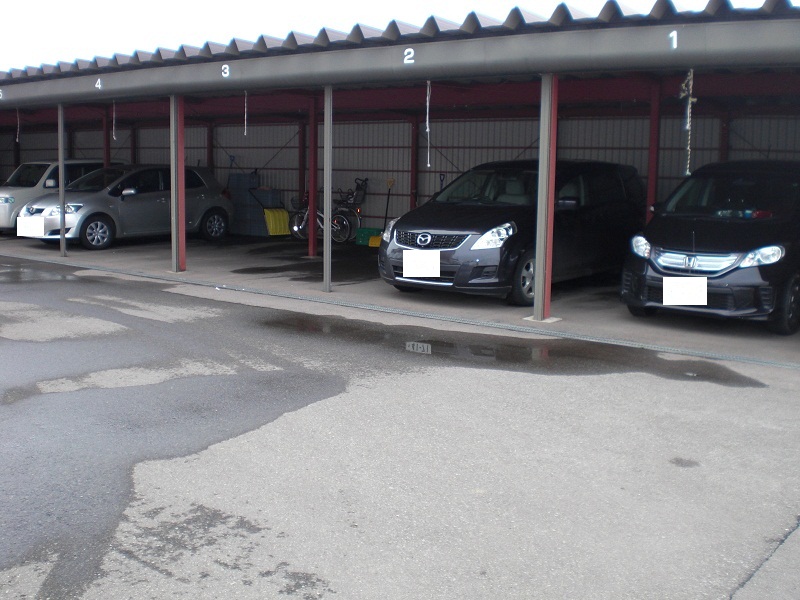 Parking lot. Very convenient garage in the snowy country