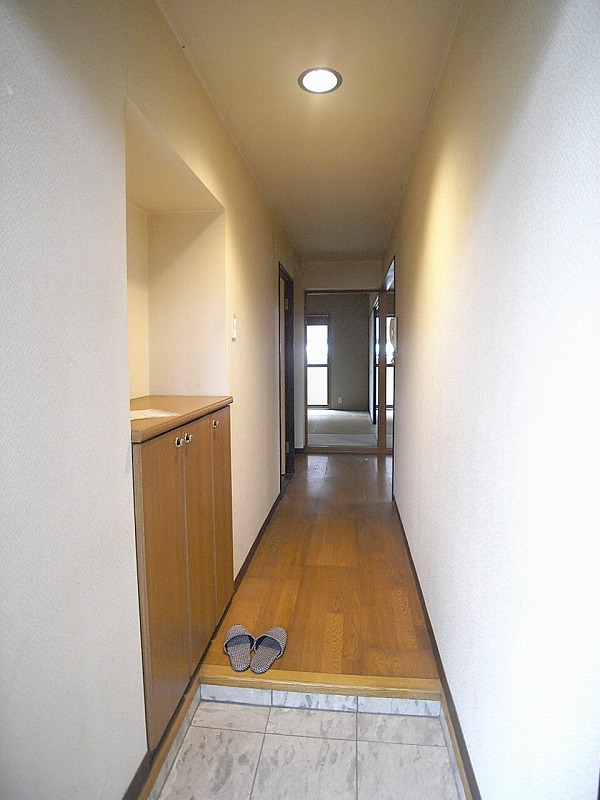 Entrance. There is also a cupboard in the entrance