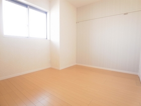 Living and room. It is a bright room.