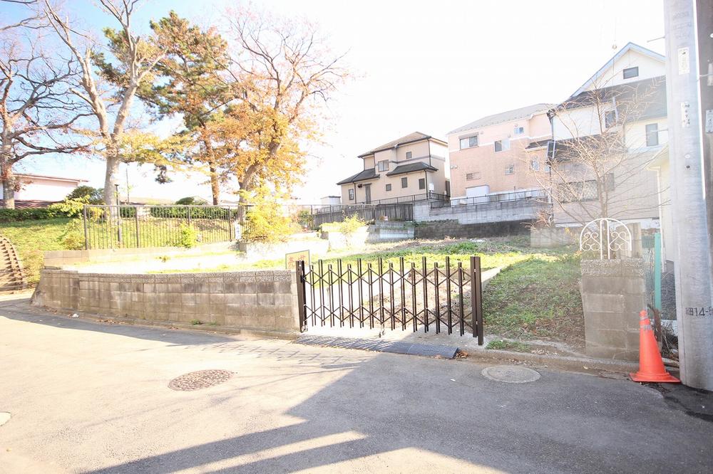 Local photos, including front road. Thank sense of openness in the corner lot