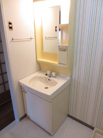 Washroom. Now a nice washroom with stripe wallpaper!