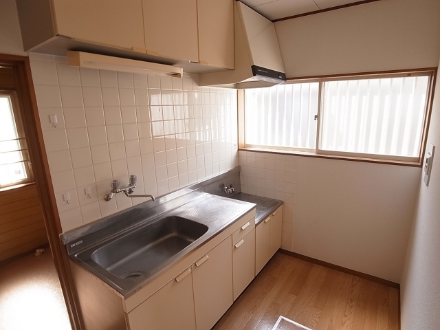 Kitchen. It is with a window in the kitchen. 