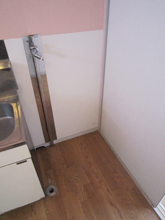 Other Equipment. Washing machine in the room