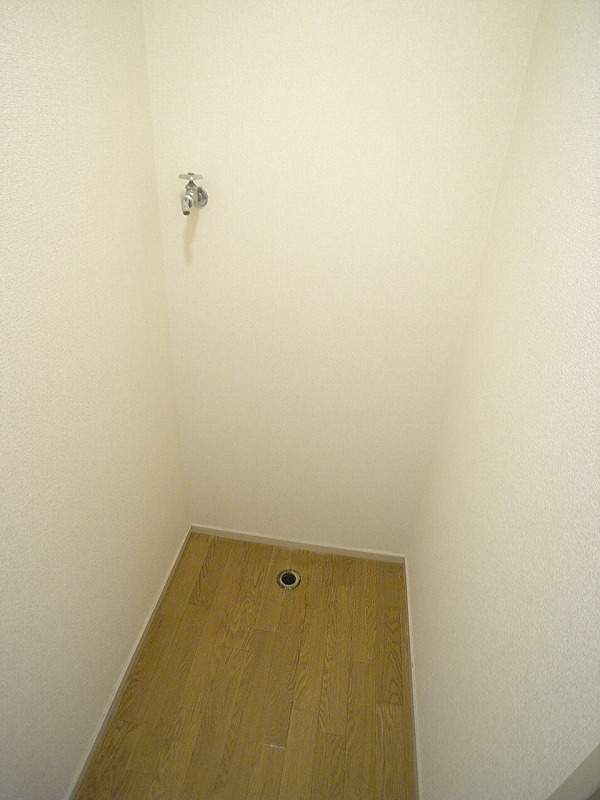 Other Equipment. Washing machine is put in a room