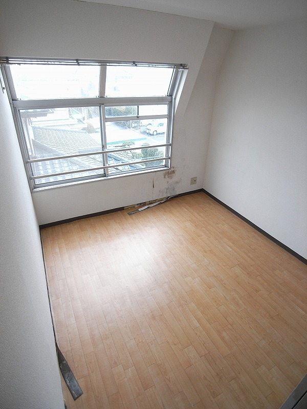 Other room space. The window is large Western-style