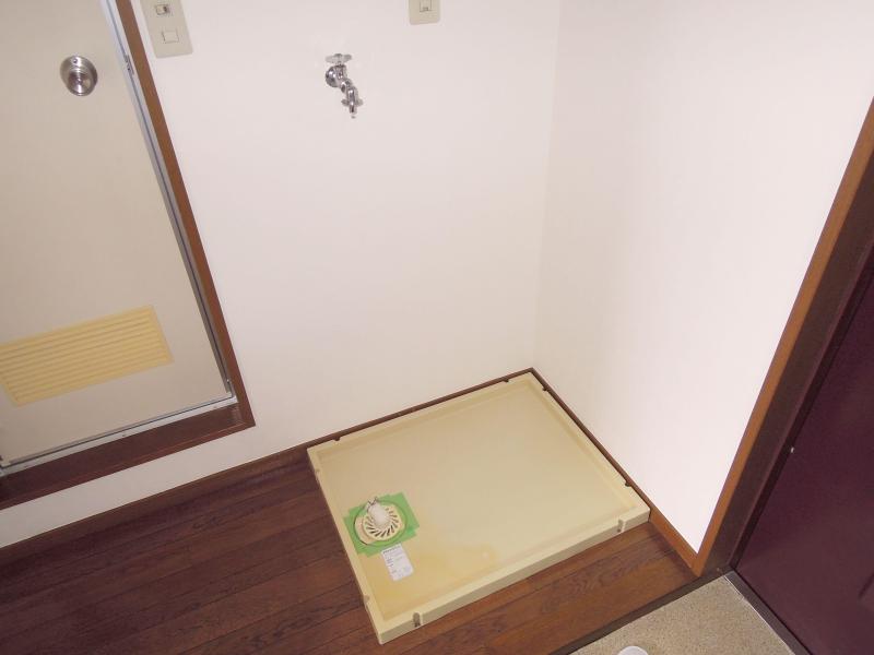 Other Equipment. It is a washing machine inside the storage rooms of the peace of mind for women.