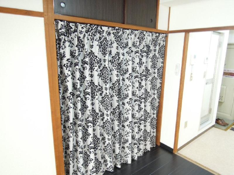 Other Equipment. Washing machine storage is also closed curtain