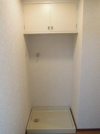 Other Equipment. Washing machine in the room