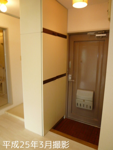 Entrance. There is a large shoe box