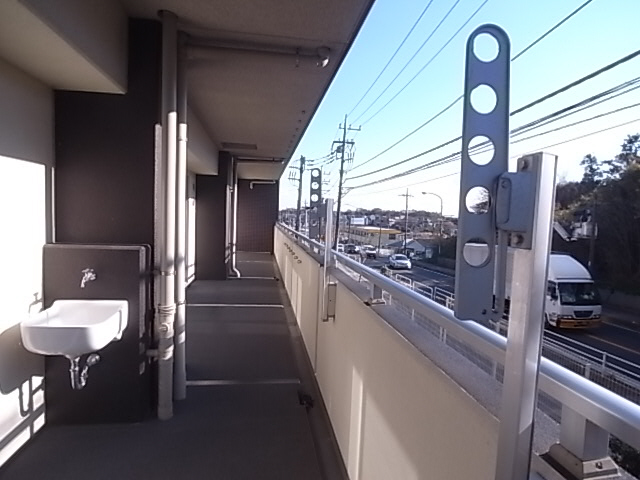 Balcony. Large balcony would be Jose a lot Even futon.