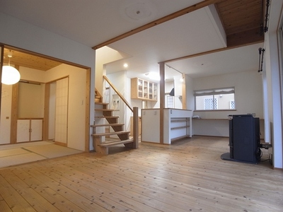 Living and room. In the middle of the living-dining is designed staircase is located.