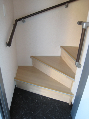 Entrance. Soon stairs on the front door, Stairs is also proprietary.