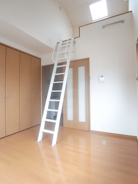 Living and room. The ceiling is high open because there is a loft