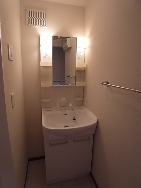 Washroom. Convenient shampoo dresser also busy morning