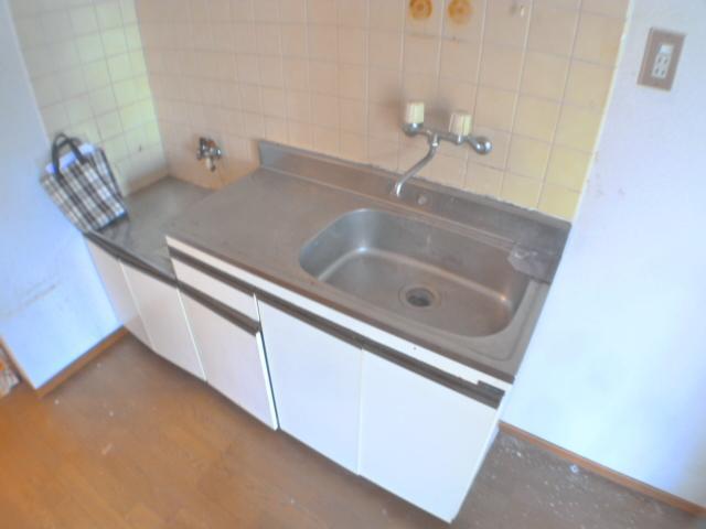 Other room space. It is a two-burner stove definitive type of kitchen.