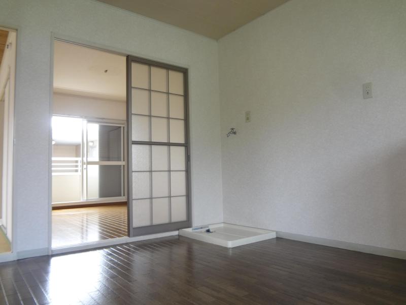 Living and room. There is also a washing machine yard