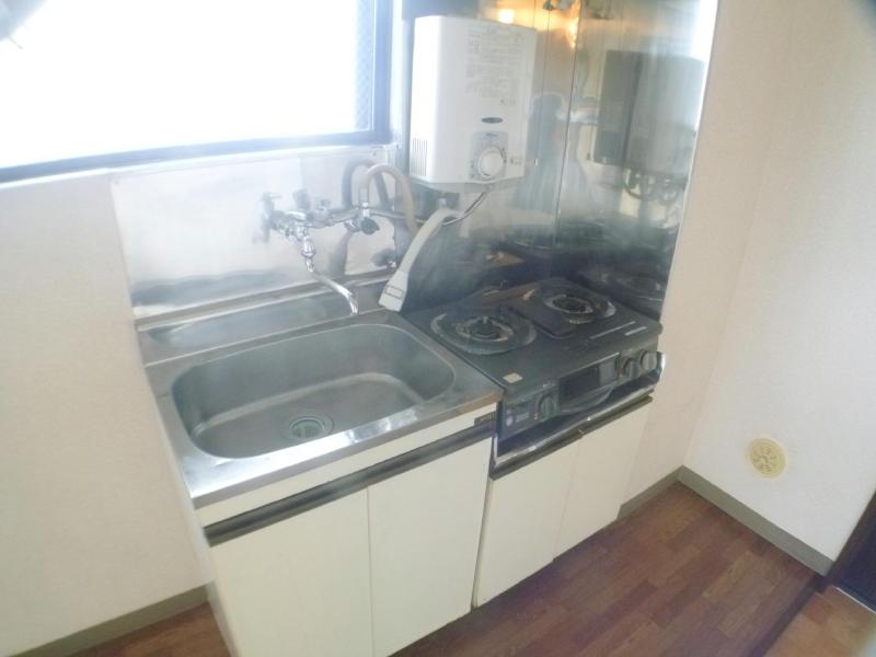 Kitchen. It comes with a gas stove and water heater. 