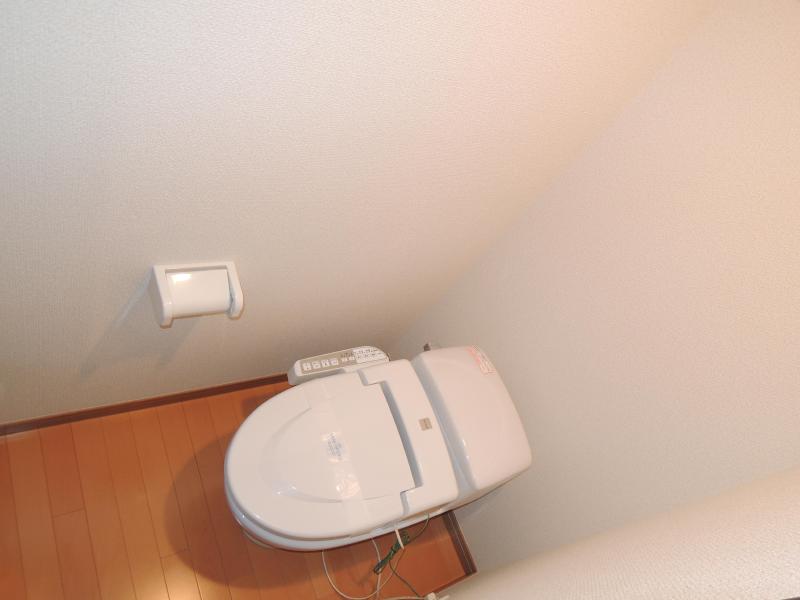 Toilet. Spacious because the bus toilet by