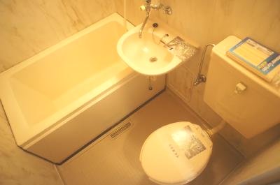 Bath. Colors of the floor and the door has become the heavy atmosphere.