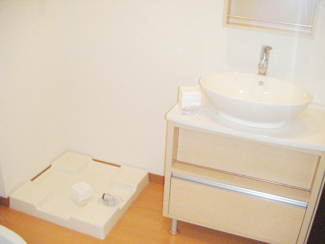 Washroom. It is a stylish wash basin happy