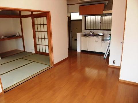 Living and room. Dining is flooring.