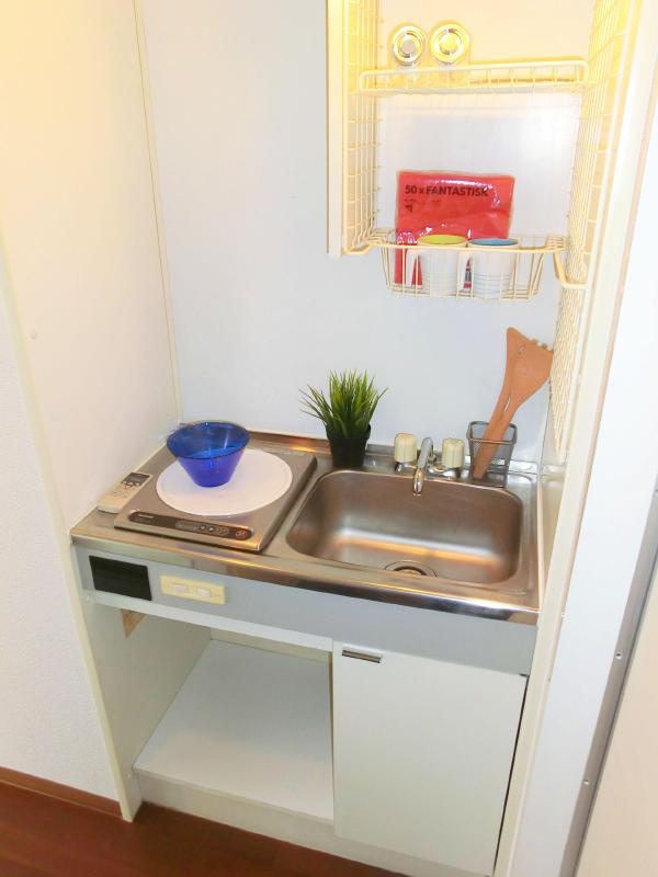 Washroom. Washing machine in the room equipped