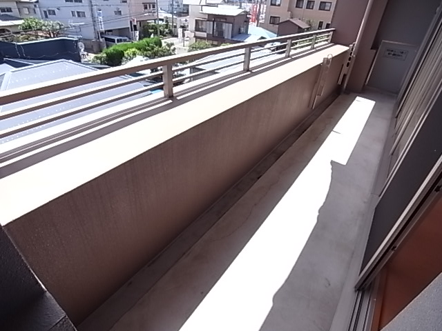 Balcony. In south-facing day it is also good.