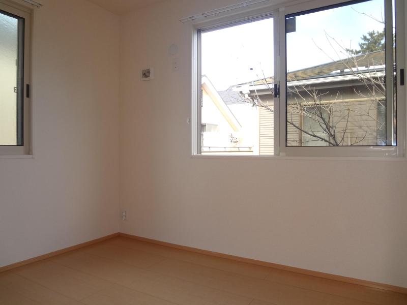 Living and room. Photograph is of the same type