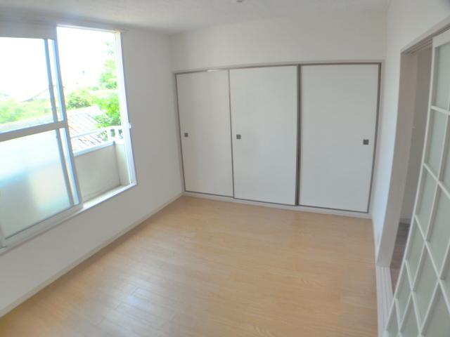 Living and room. The room is very bright.