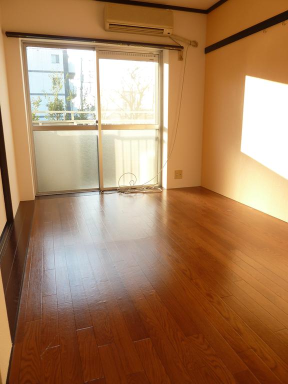 Living and room. Large windows is bright and airy.