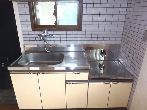 Kitchen. Bright kitchen with a window. Gas stove can be installed