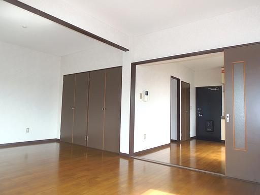 Living and room. All is the flooring of the room. 