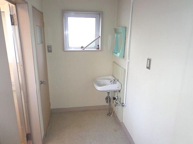 Washroom. You put in a room washing machine.