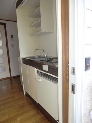 Kitchen. It is a kitchen with a refrigerator