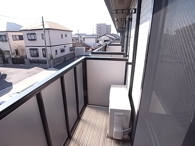 Balcony. Veranda. Pat day because the front is also a parking lot on the south-facing. 