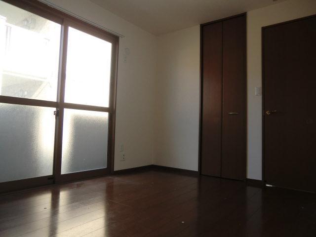 Other room space. It is muted colors of the room