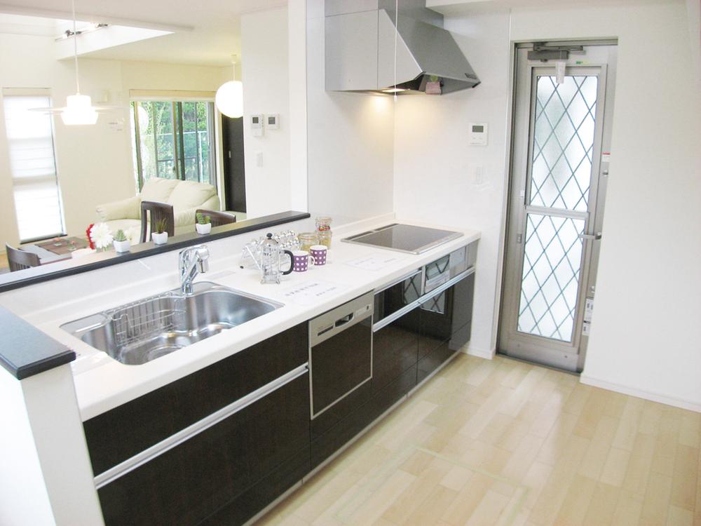 Model house photo. Open kitchen