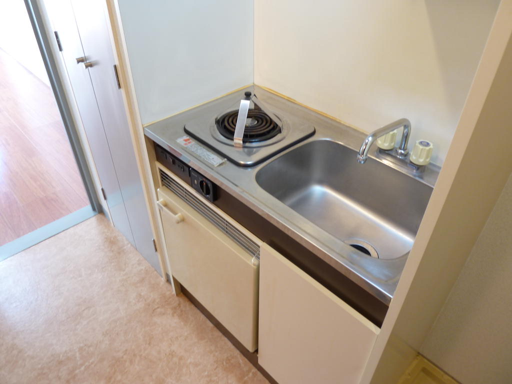 Kitchen. Bite electric stove, It comes with a mini fridge.