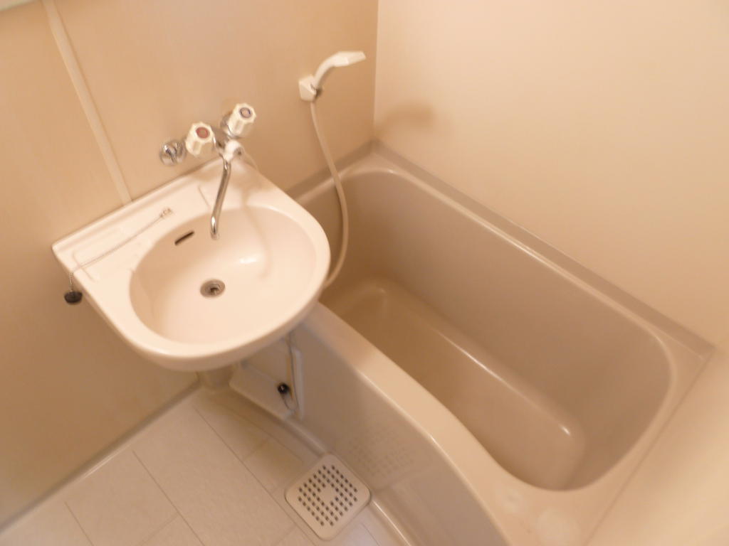 Bath. It is a basin with the bathroom.