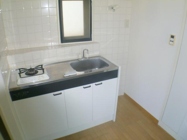 Kitchen. Refrigerator is put next to