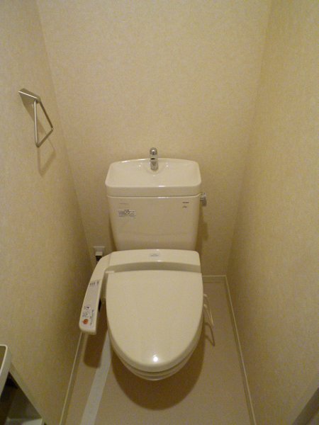 Toilet. It is with warm water washing machine.