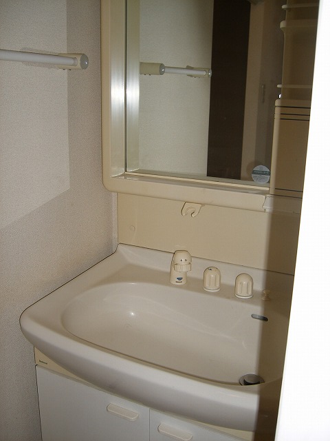 Washroom. With separate wash basin.