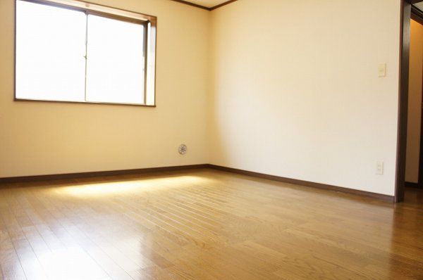 Living and room. It is a gas stove with a kitchen