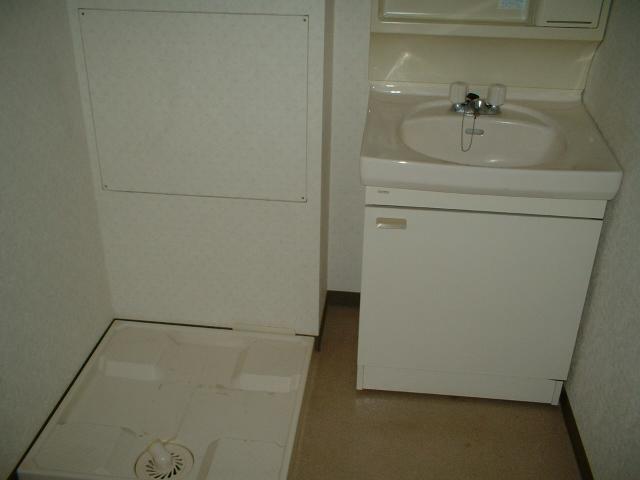 Washroom. It is a washing machine inside the field of peace of mind