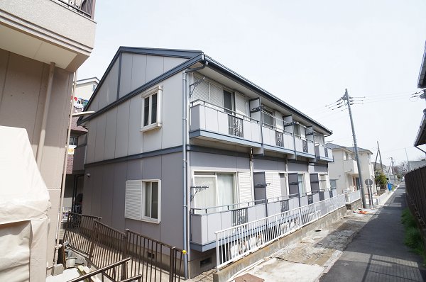 Building appearance. Sunny property.