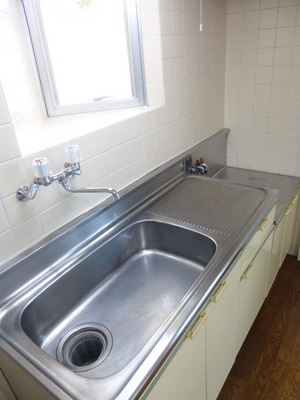 Kitchen. It is bright there is a window in the kitchen