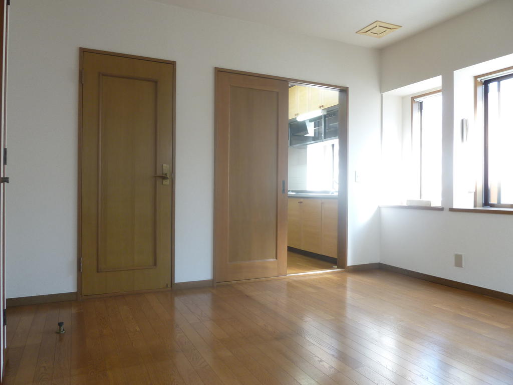 Living and room. Large windows is bright and airy.