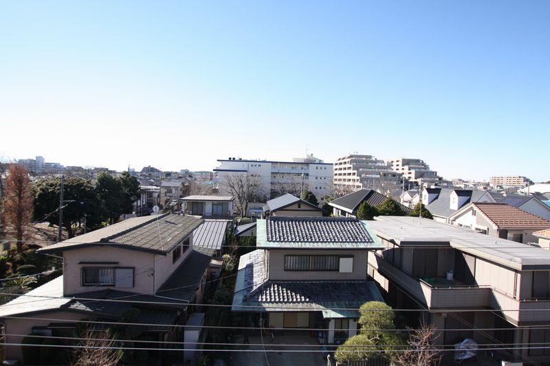 View photos from the dwelling unit. For good views of the neighboring low-rise residential area