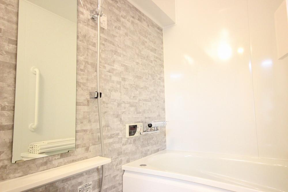 Bathroom. Panel of the bath is modern