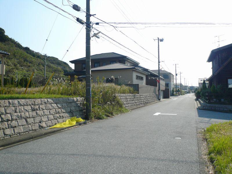 Local photos, including front road. Local land photo 12